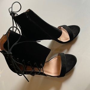 Black zip up heels